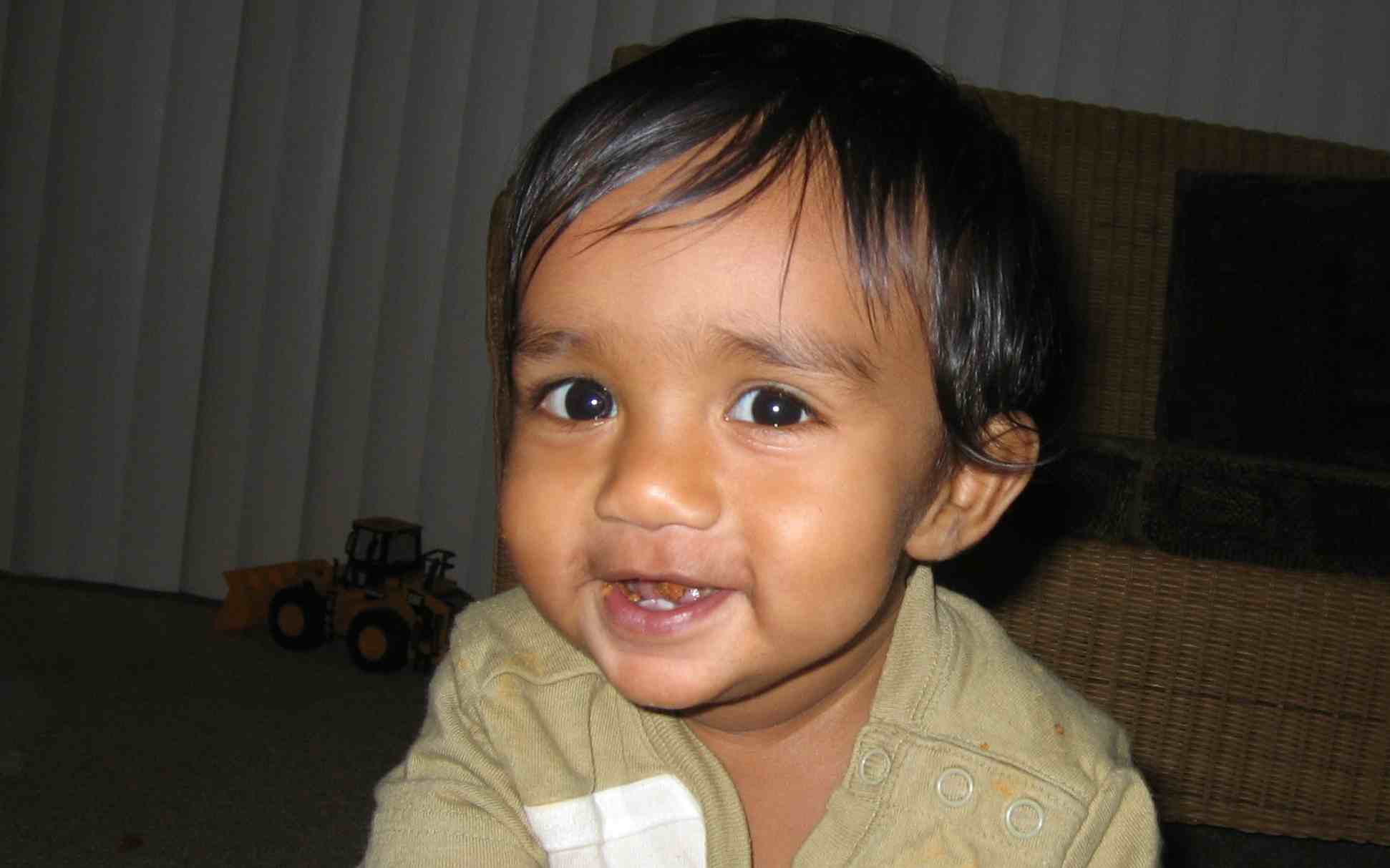 A happy baby smiling, representing the pediatric care at Cupertino Pediatrics.
